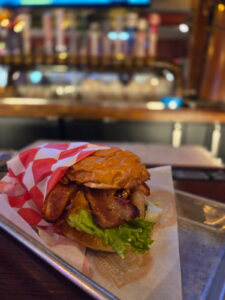 Pismo Beach Smash Burger - Burger on a bar.